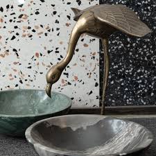 Mixing Mediums: Pairing Stone with Glass, Wood, or Ceramic in Art