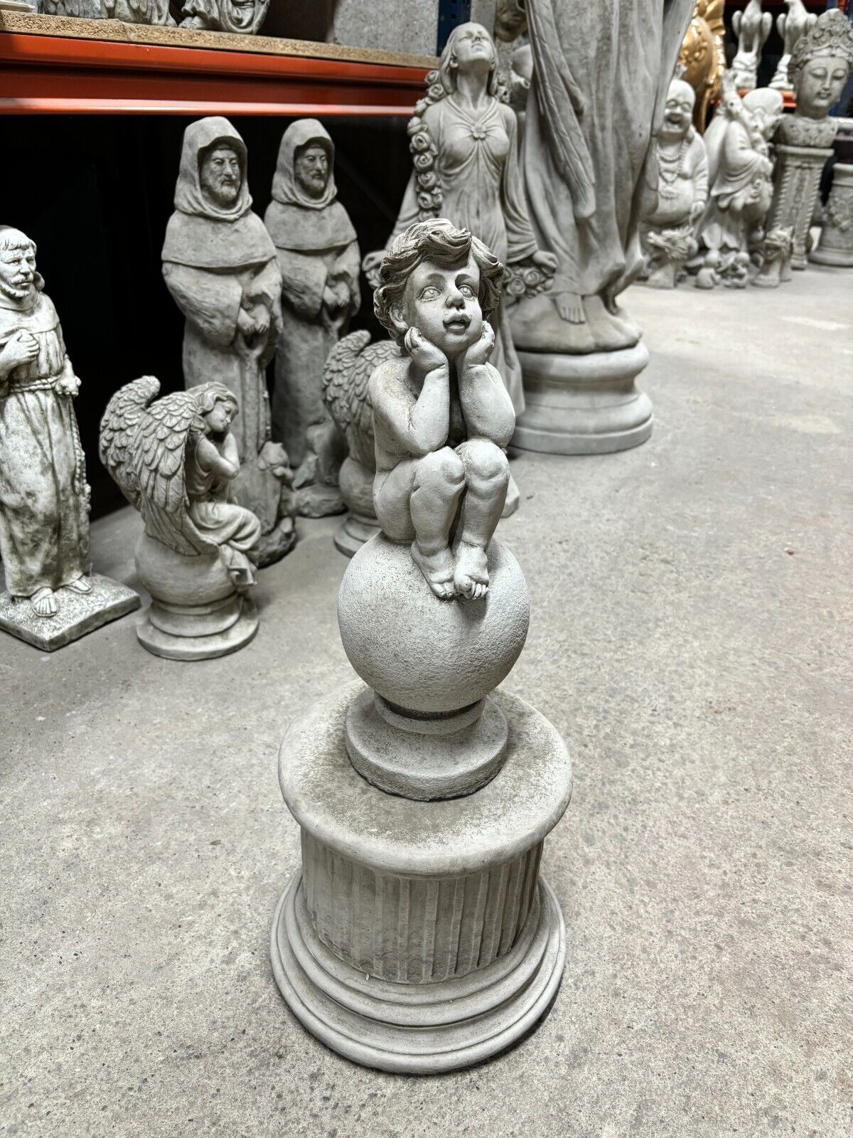Stone Cherub on Ball Ornament