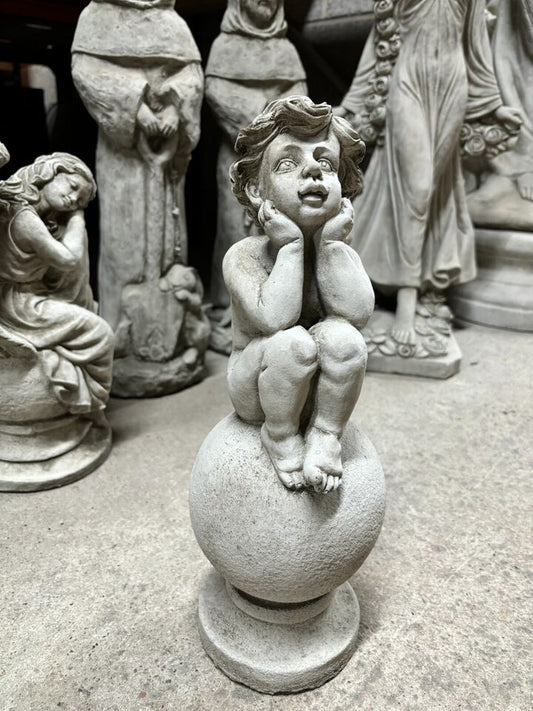 Stone Cherub on Ball Ornament