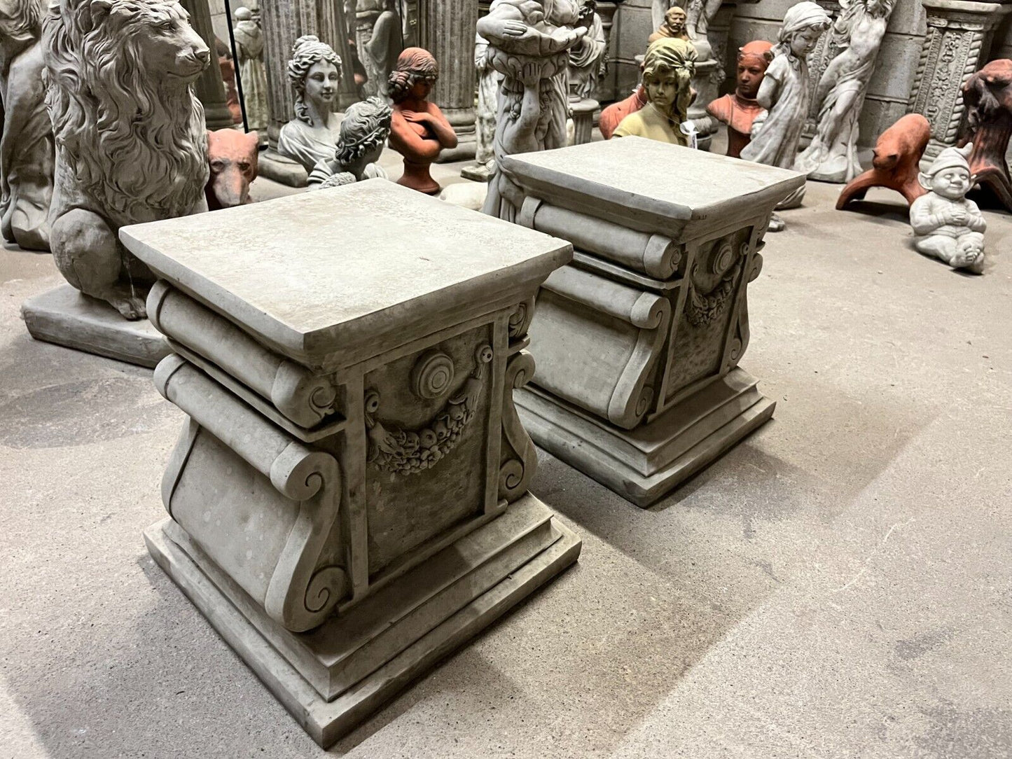 Pair of Stone Garland Style Plinths