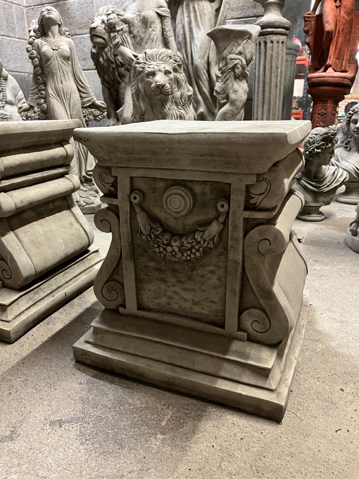 Pair of Stone Garland Style Plinths