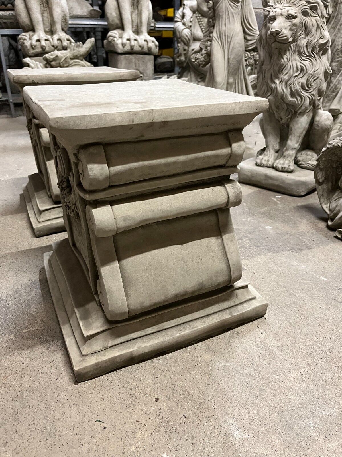 Pair of Stone Garland Style Plinths