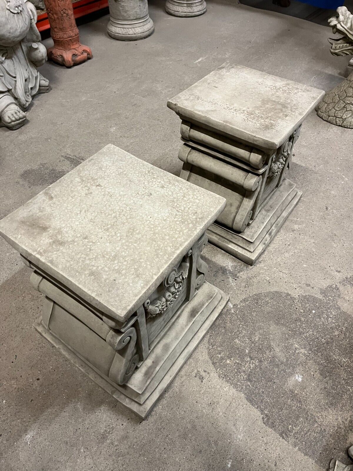 Pair of Stone Garland Style Plinths