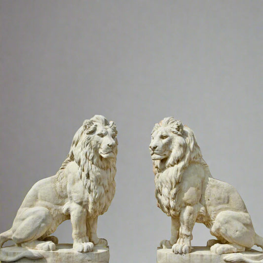 Majestic Stone Lion Statues - XL White Stone pair seated on platforms, ideal for guarding entrances and estate pathways with regal presence.