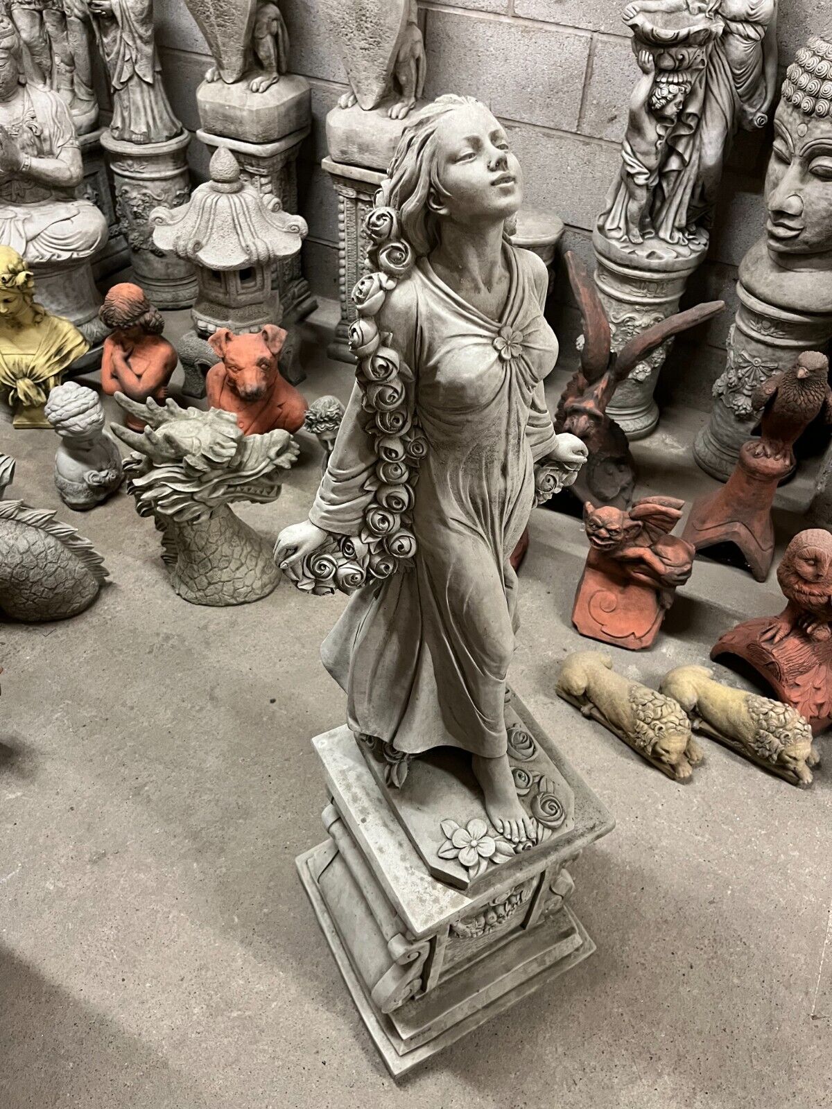 Stone Lady of Roses Statue