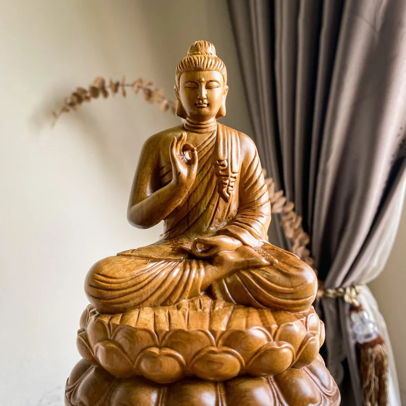 Hand-carved Wooden Abhaya Buddha Statue in meditation pose on lotus base, symbolizing fearlessness and protection. Ideal for home or garden decor.