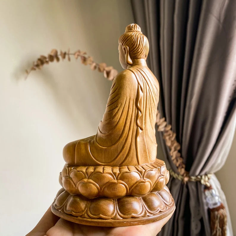 Rear side of Wooden Abhaya Buddha Statue highlighting flowing robe carvings and smooth wood finish, suitable for indoor or outdoor display.