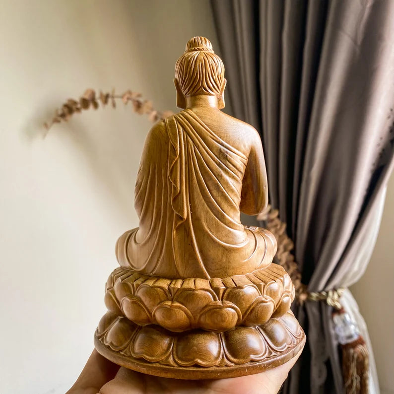 Back view of Wooden Abhaya Buddha Statue seated on lotus pedestal, showcasing craftsmanship and natural wood grain texture.