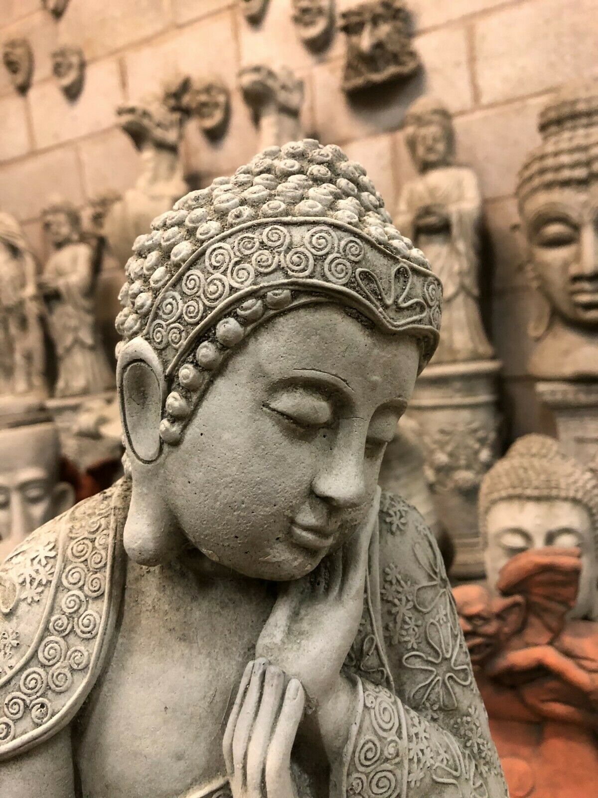 Stone Hands on Cheek Buddha Ornament