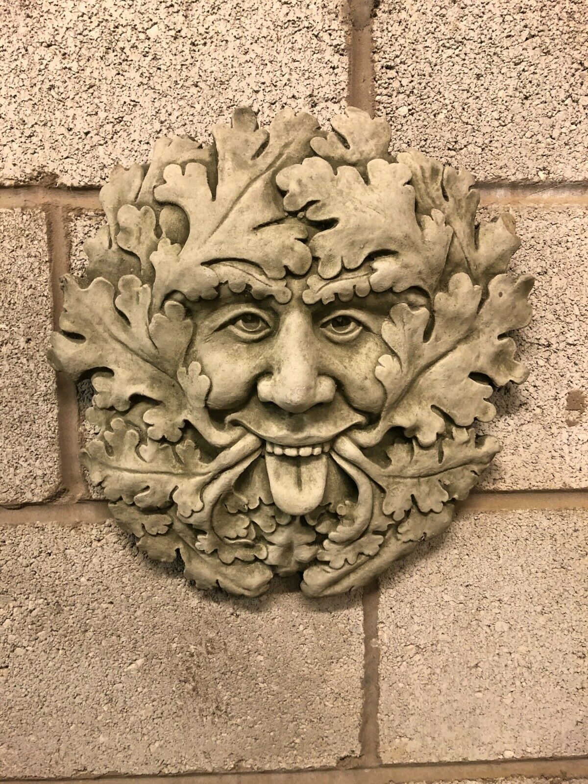 Stone Tongue Out Greenman Plaque - Durable & Eye-catching | 35cm wall decor featuring a mythological face with oak leaves and tongue out design.