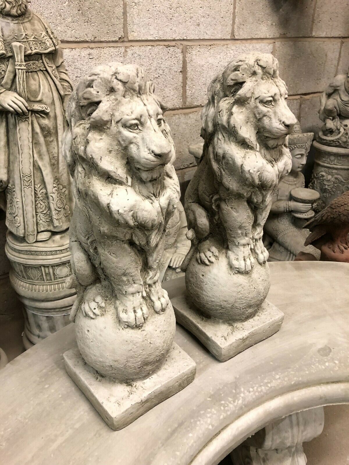 Pair of Stone Lion on Ball Finials
