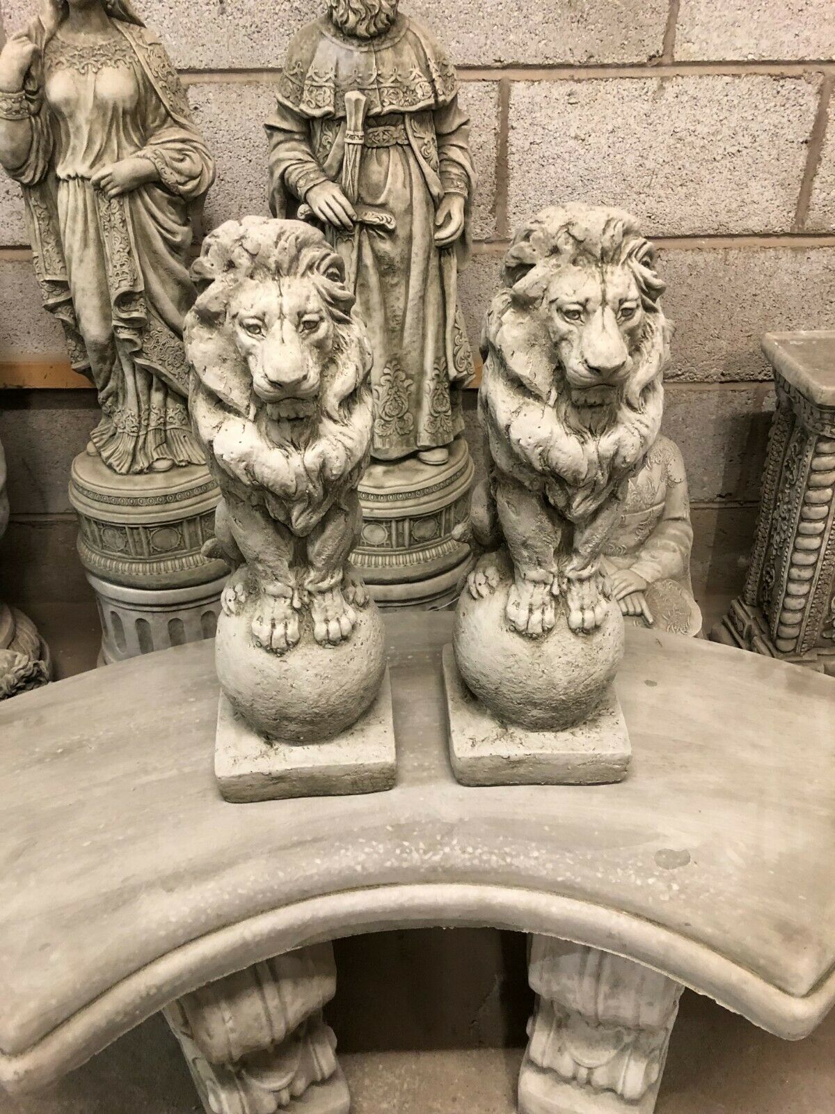Pair of Stone Lion on Ball Finials