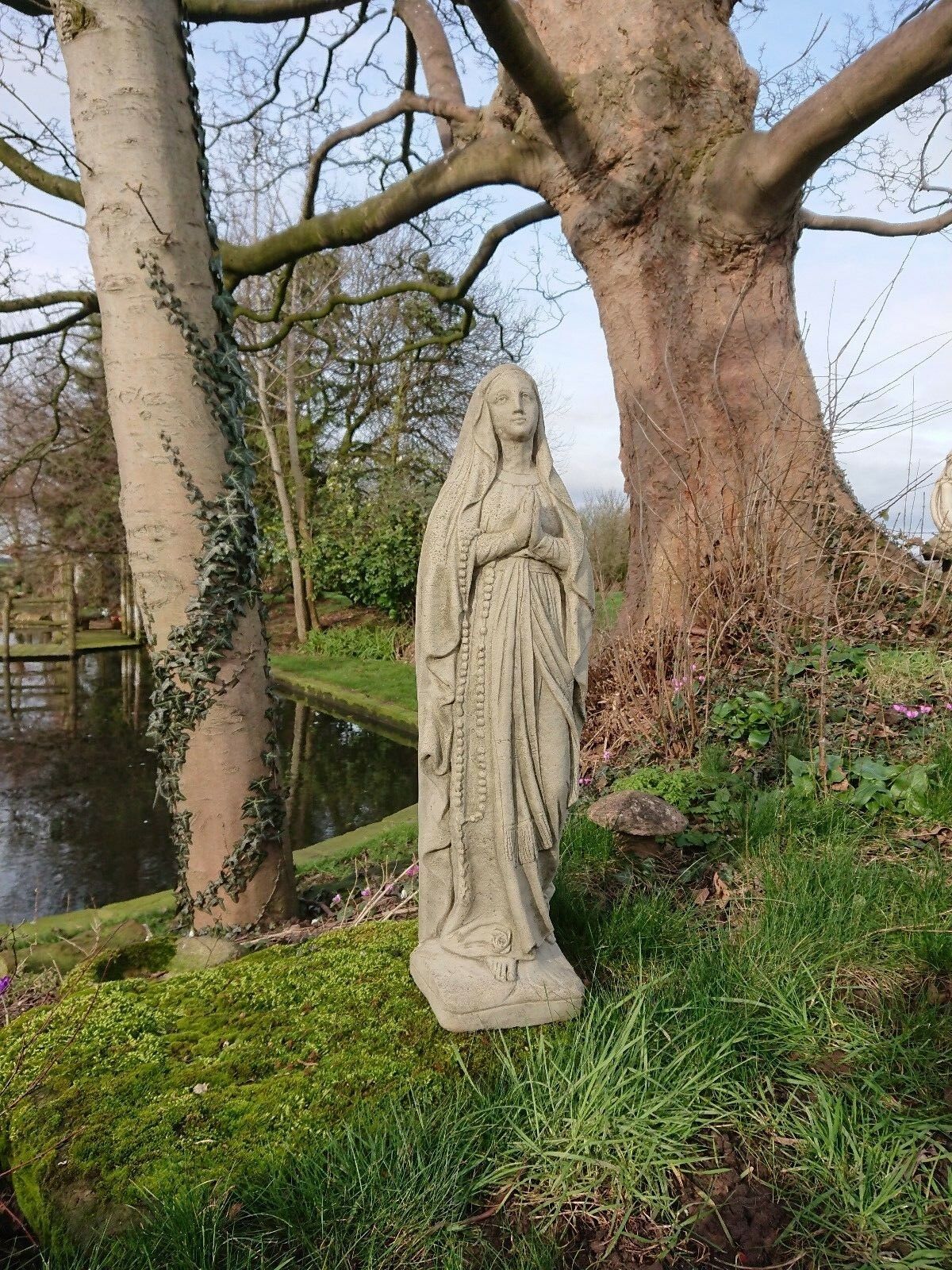 Stone Virgin Mary statue
