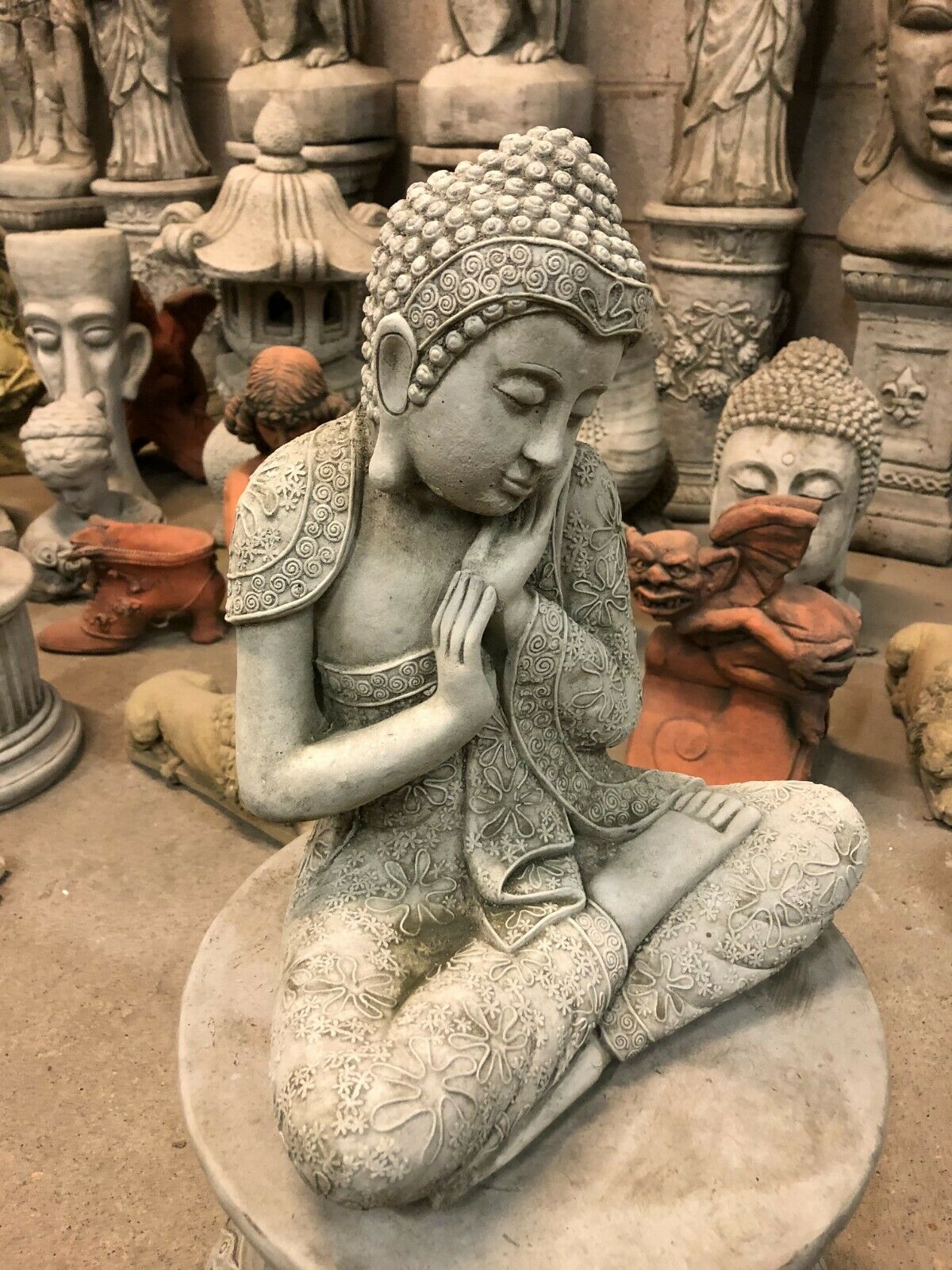 Stone Hands on Cheek Buddha Ornament