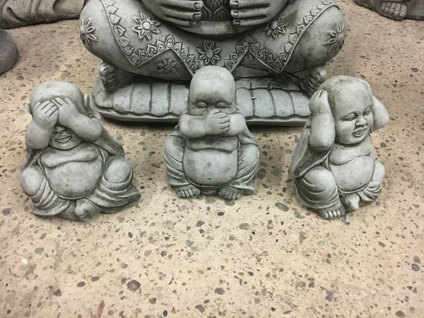 Stone Buddha Ornaments - Hear, See & Speak No Evil set featuring three small limestone Buddhas in classic poses, ideal for garden decor.