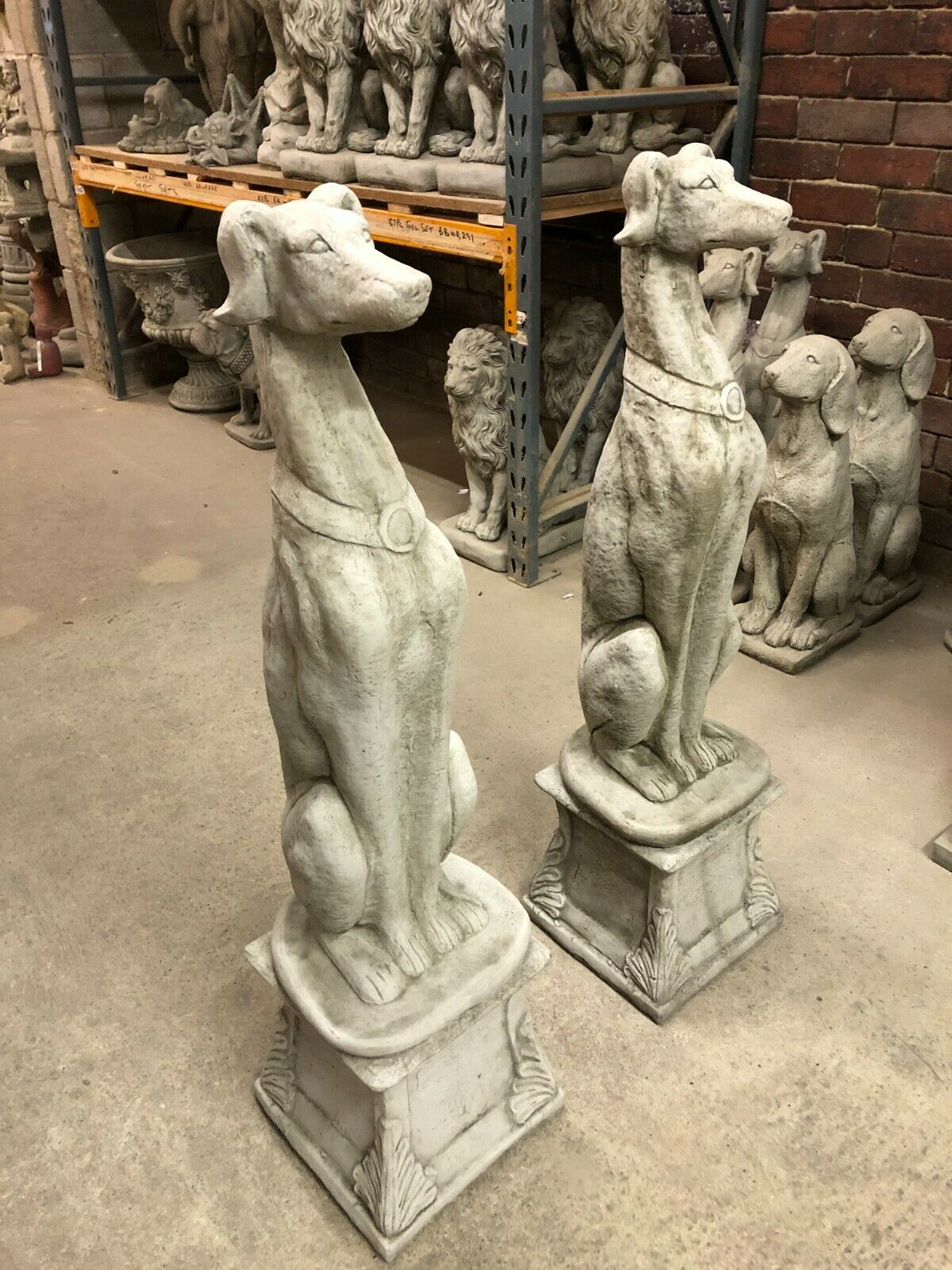 Pair of Stone Greyhound/Saluki/Whippet Plinth Statues