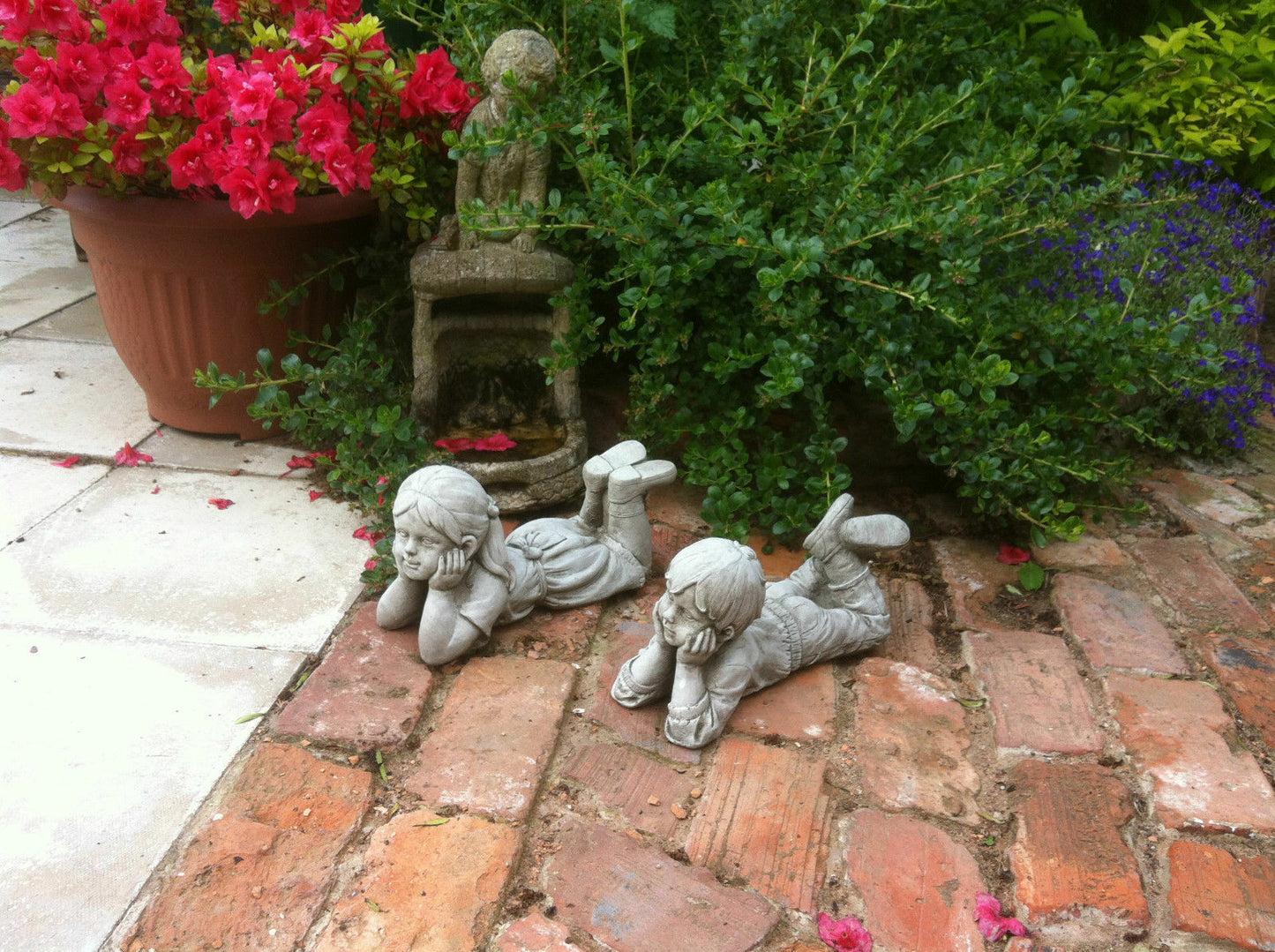 Stone Laying Down Boy & Girl Ornaments