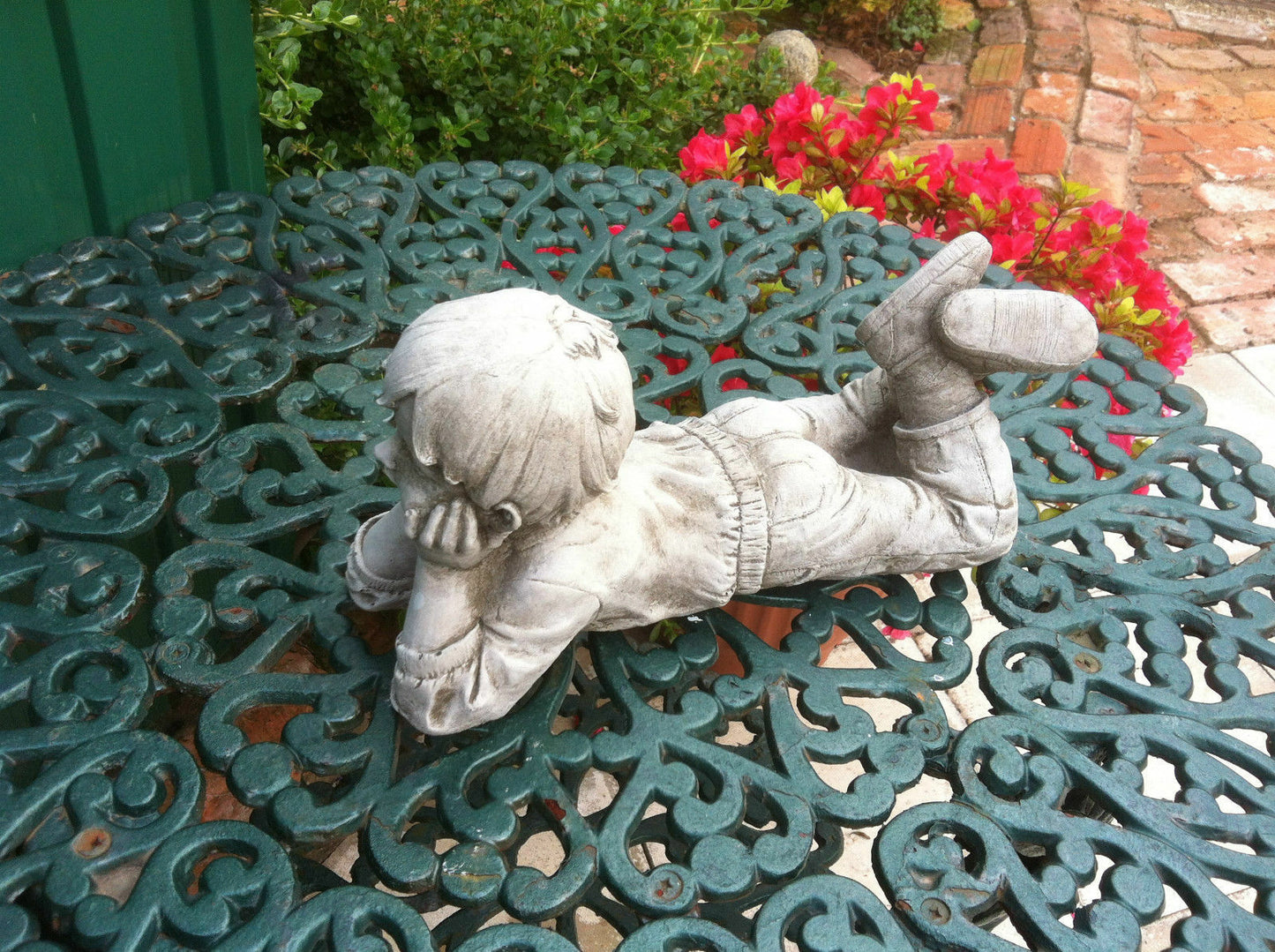 Stone Laying Down Boy Ornament