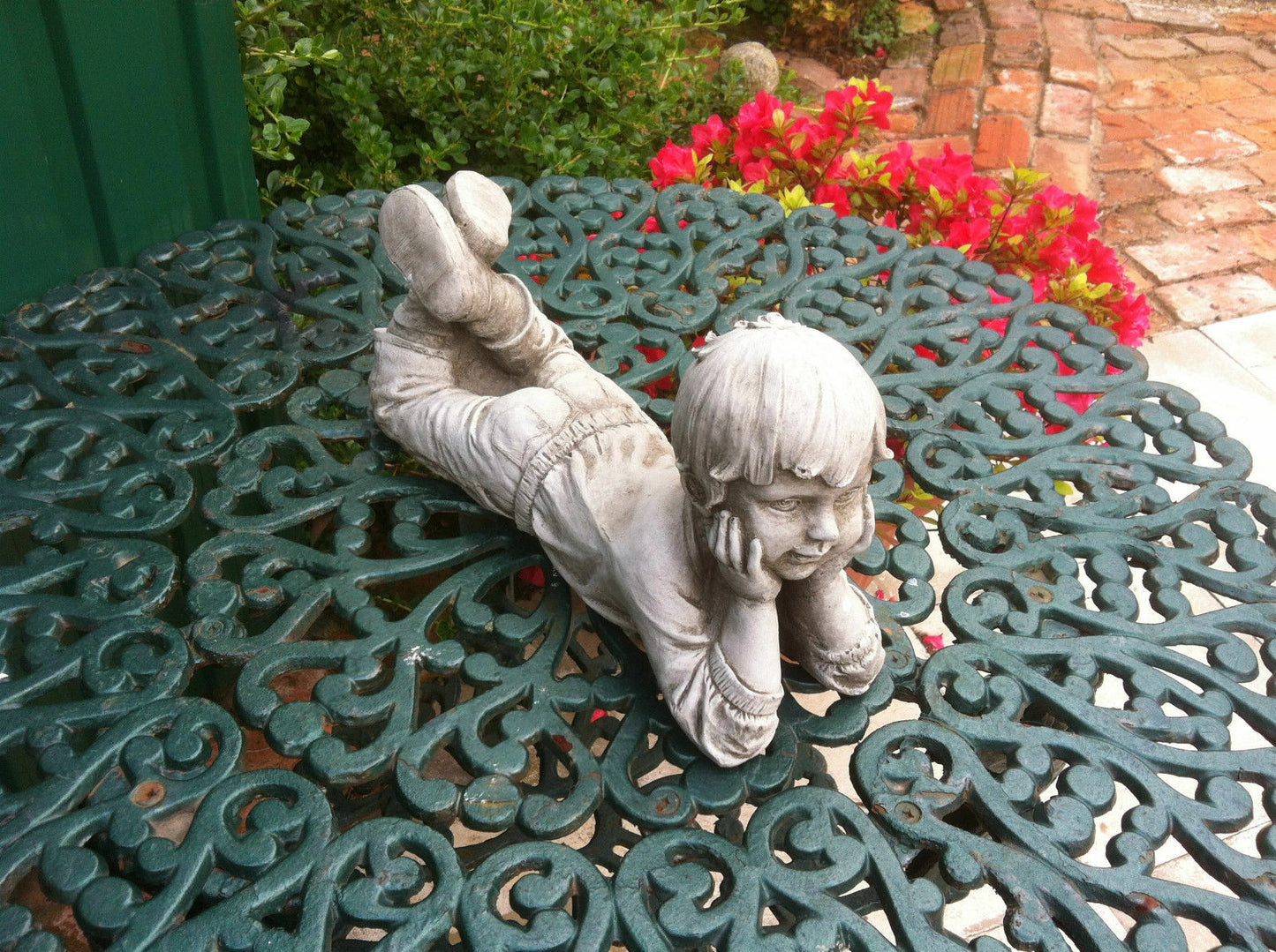Stone Laying Down Boy Ornament