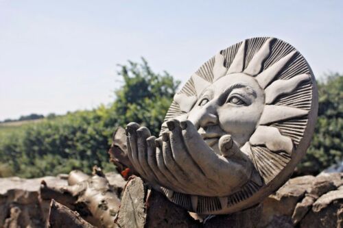 Stone Sun Face Bird Feeder