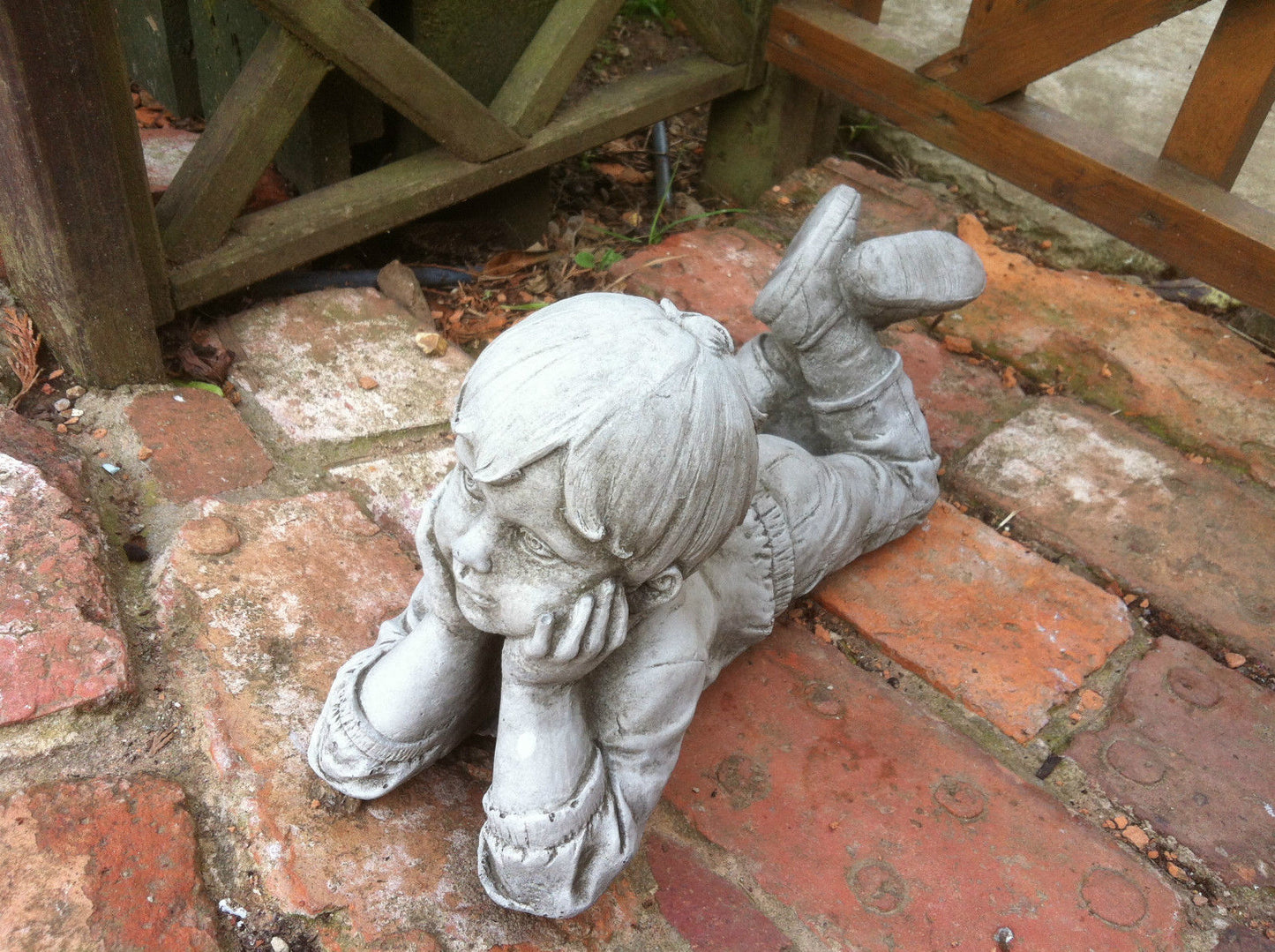 Stone Laying Down Boy Ornament