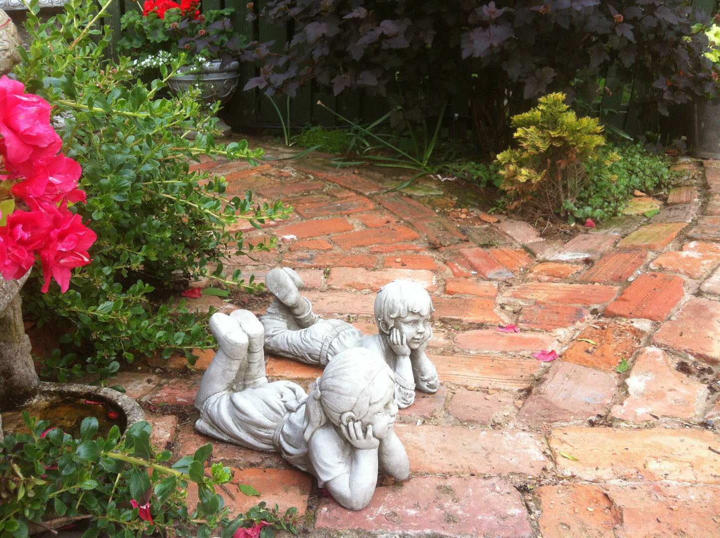 Stone Laying Down Boy & Girl Ornaments