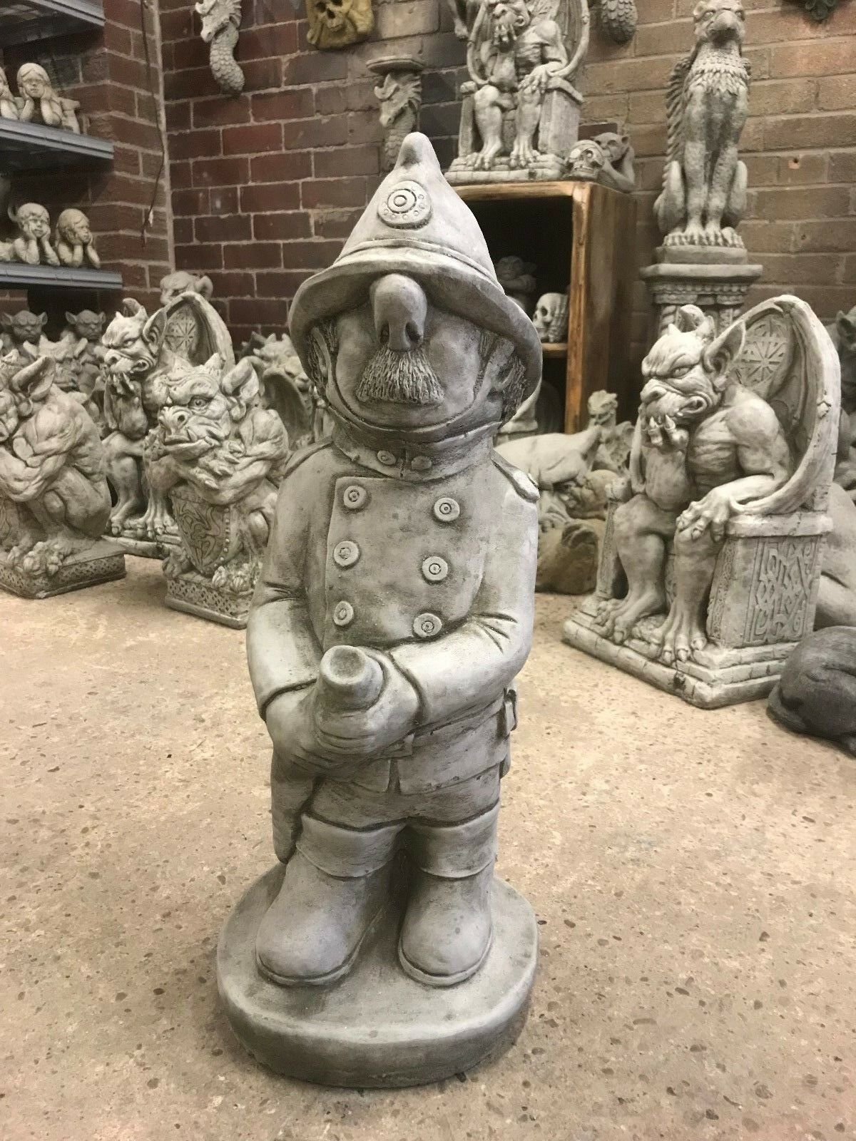 Stone Fireman with Hosepipe Ornament