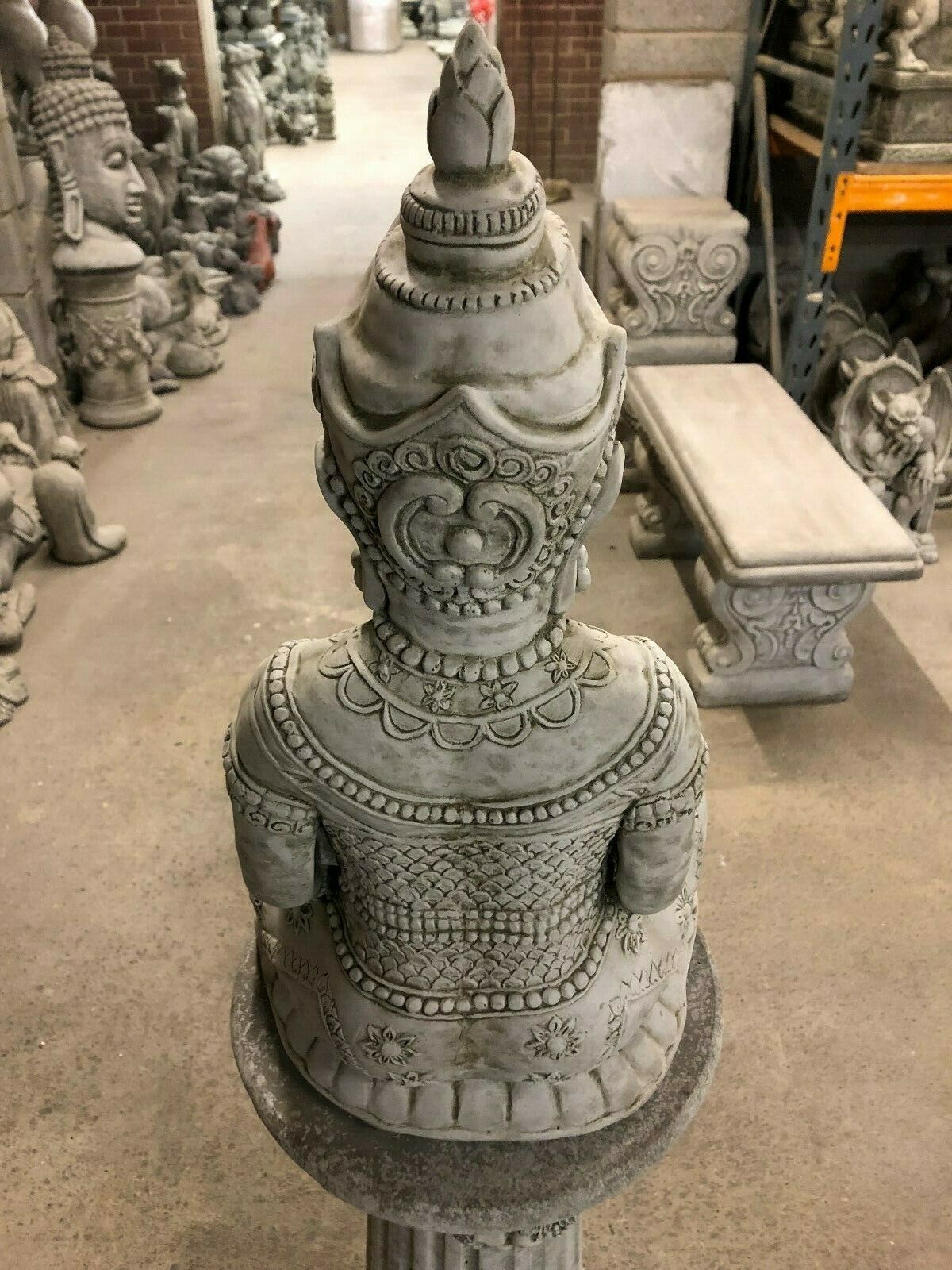 Rear view of Stone Buddha Bust - Garden Ornament displaying intricate back detailing and sculpted textures, suitable for outdoor spiritual decor.