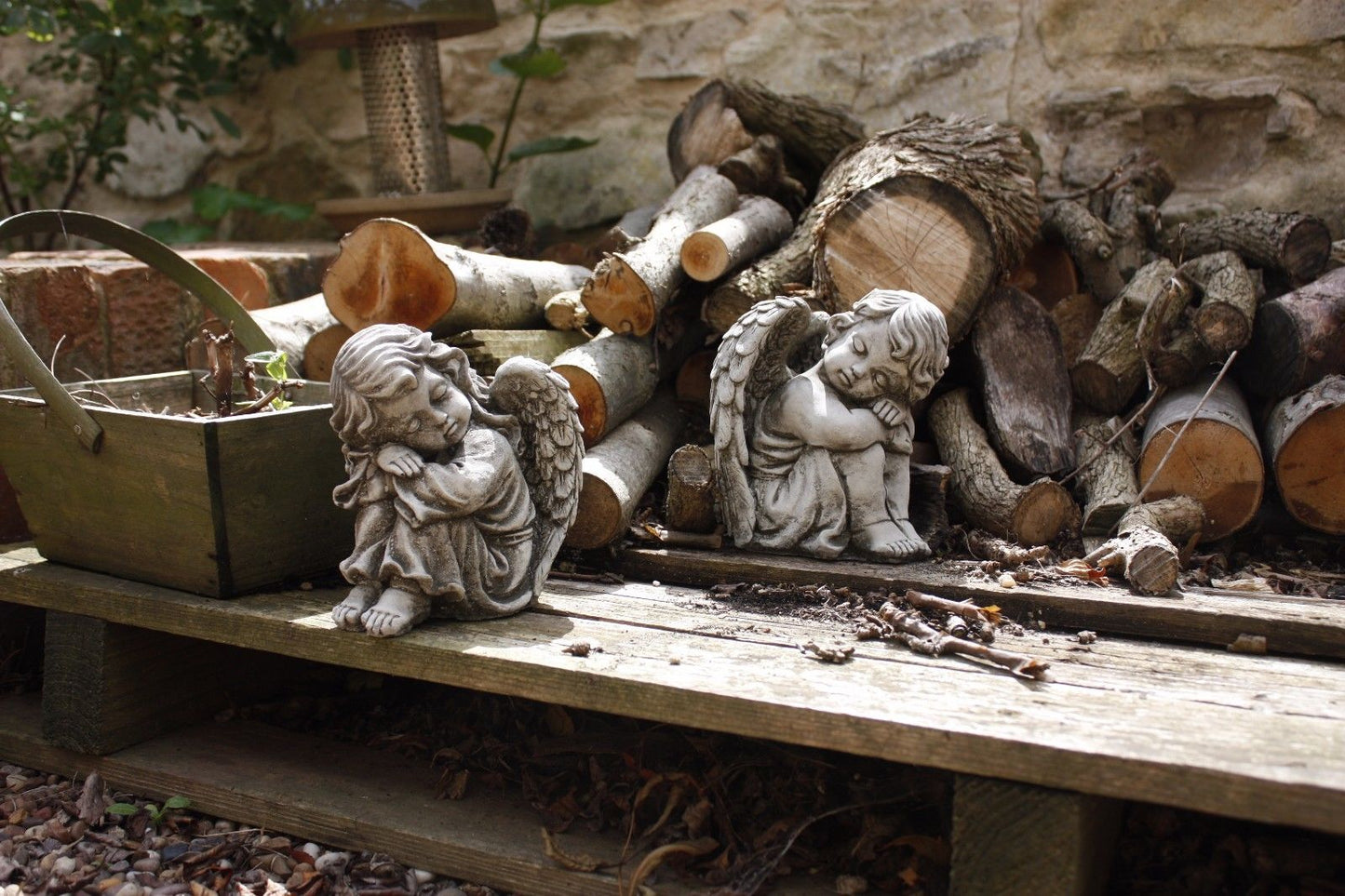 Pair of Small Stone Sleeping Angel Ornaments