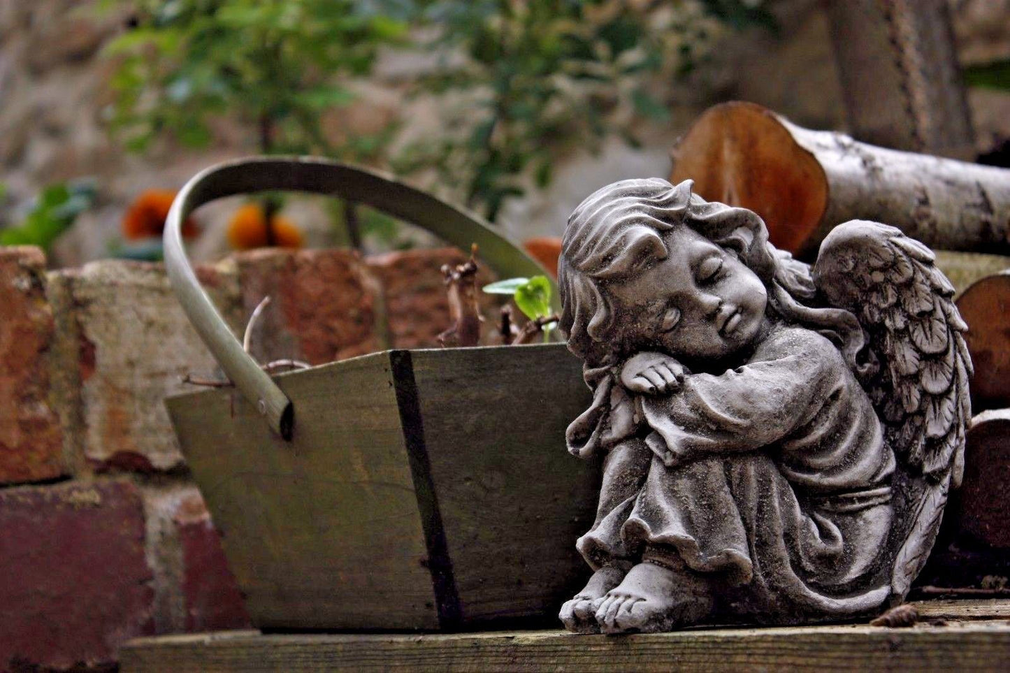 Pair of Small Stone Sleeping Angel Ornaments