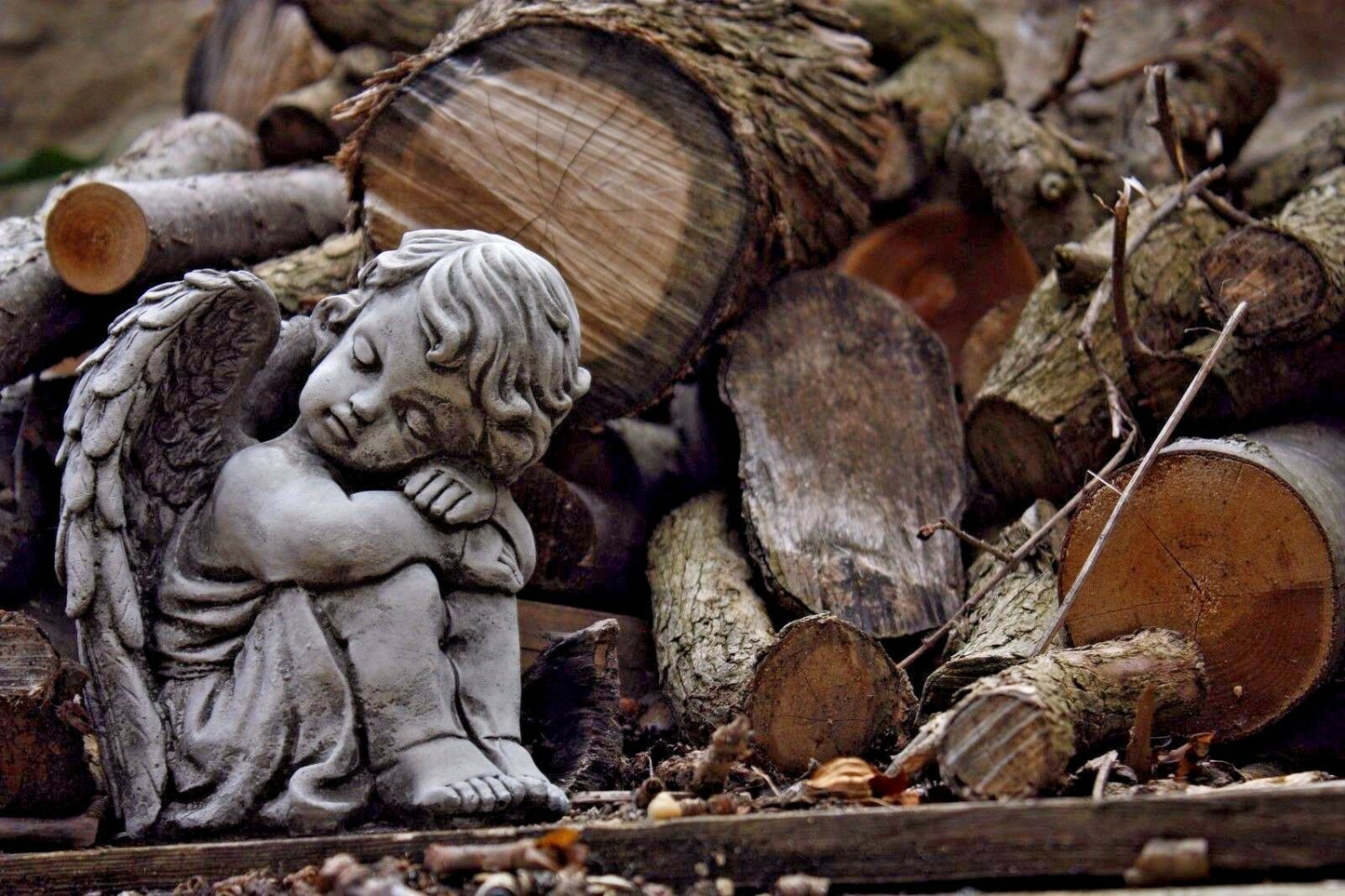 Pair of Small Stone Sleeping Angel Ornaments