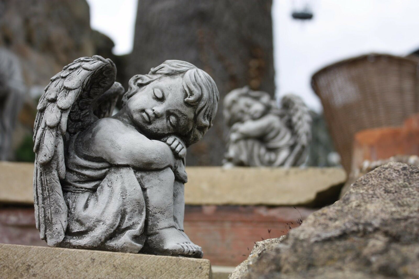 Pair of Small Stone Sleeping Angel Ornaments