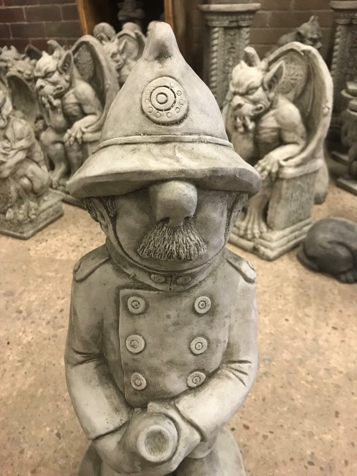 Stone Fireman with Hosepipe Ornament