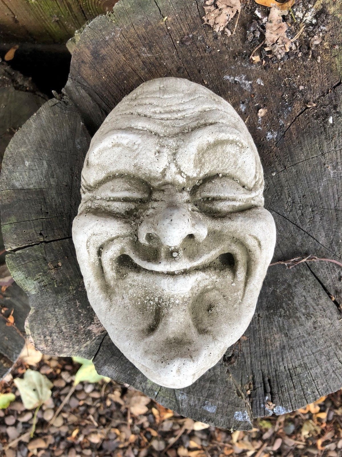 Stone Smug Face Wall Plaque