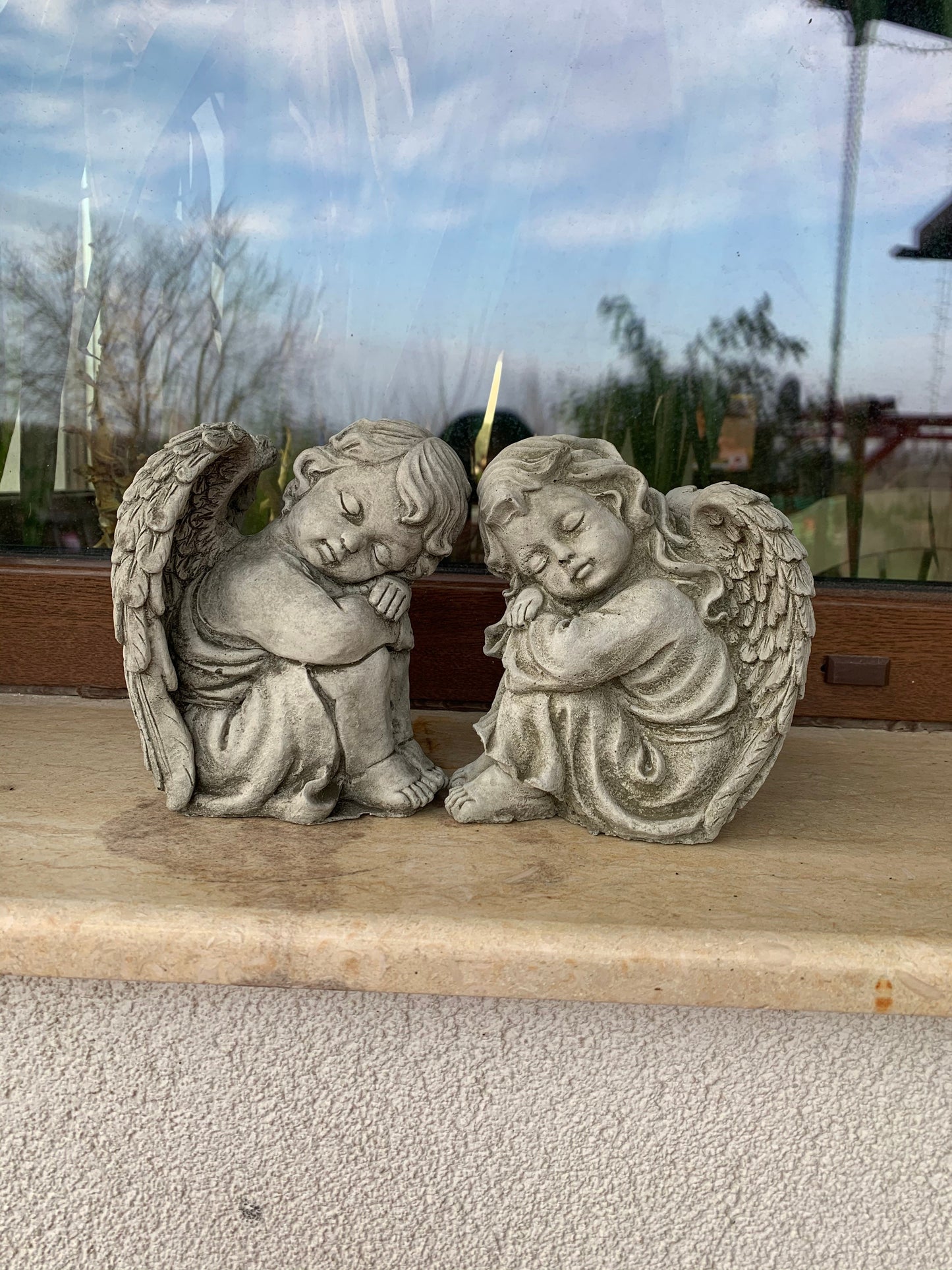 Pair of Small Stone Sleeping Angel Ornaments