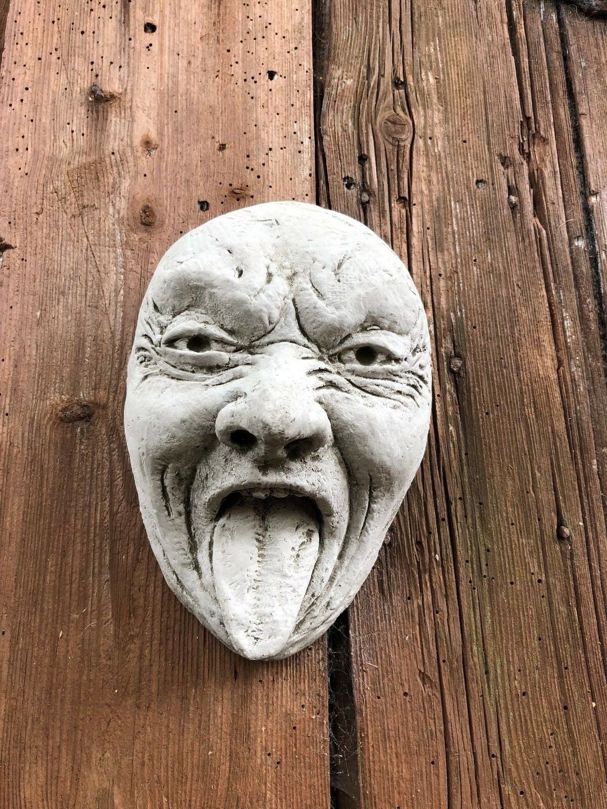 Stone Funny Tongue Out Face Wall Plaque