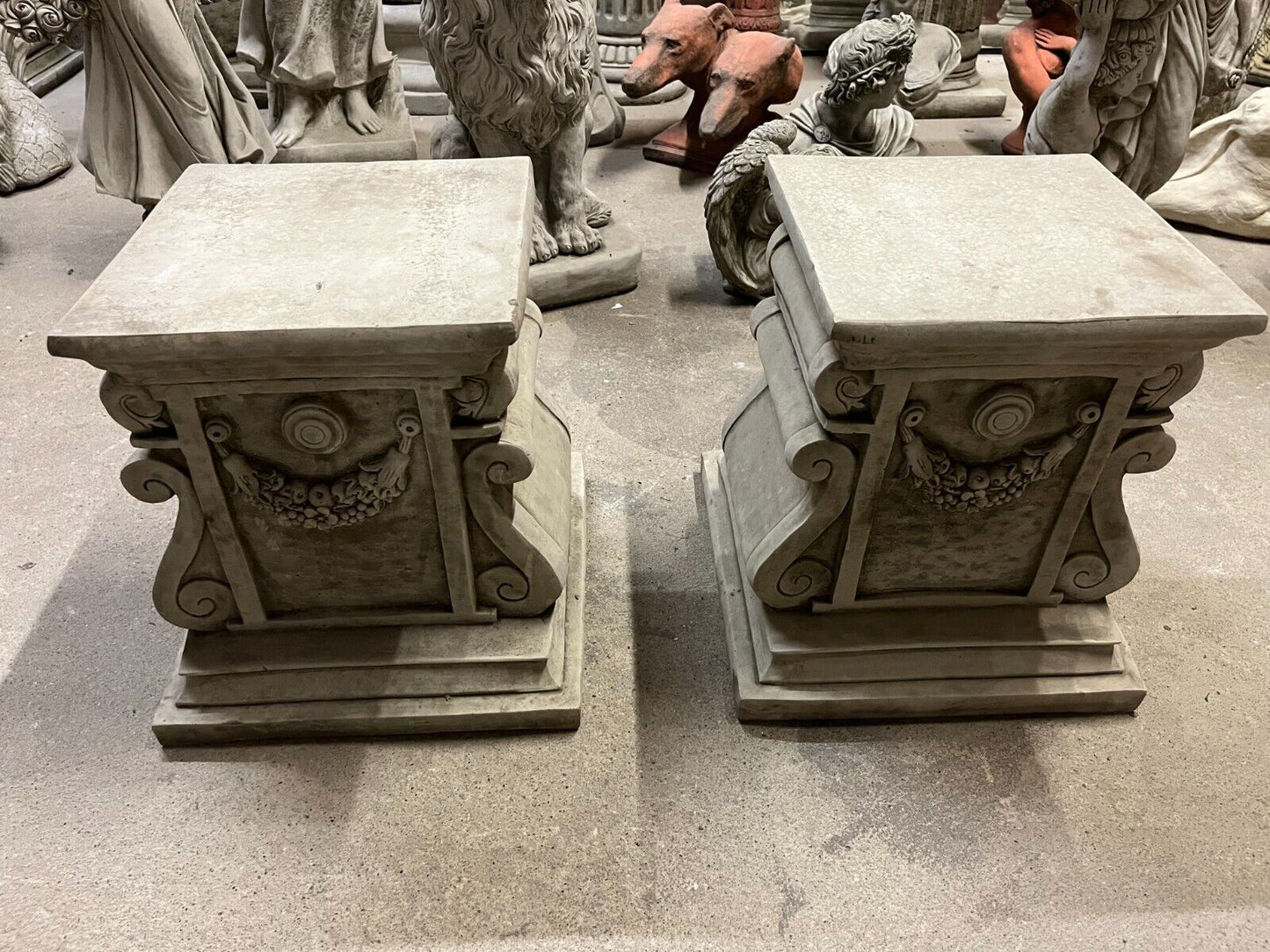 Pair of Stone Garland Style Plinths