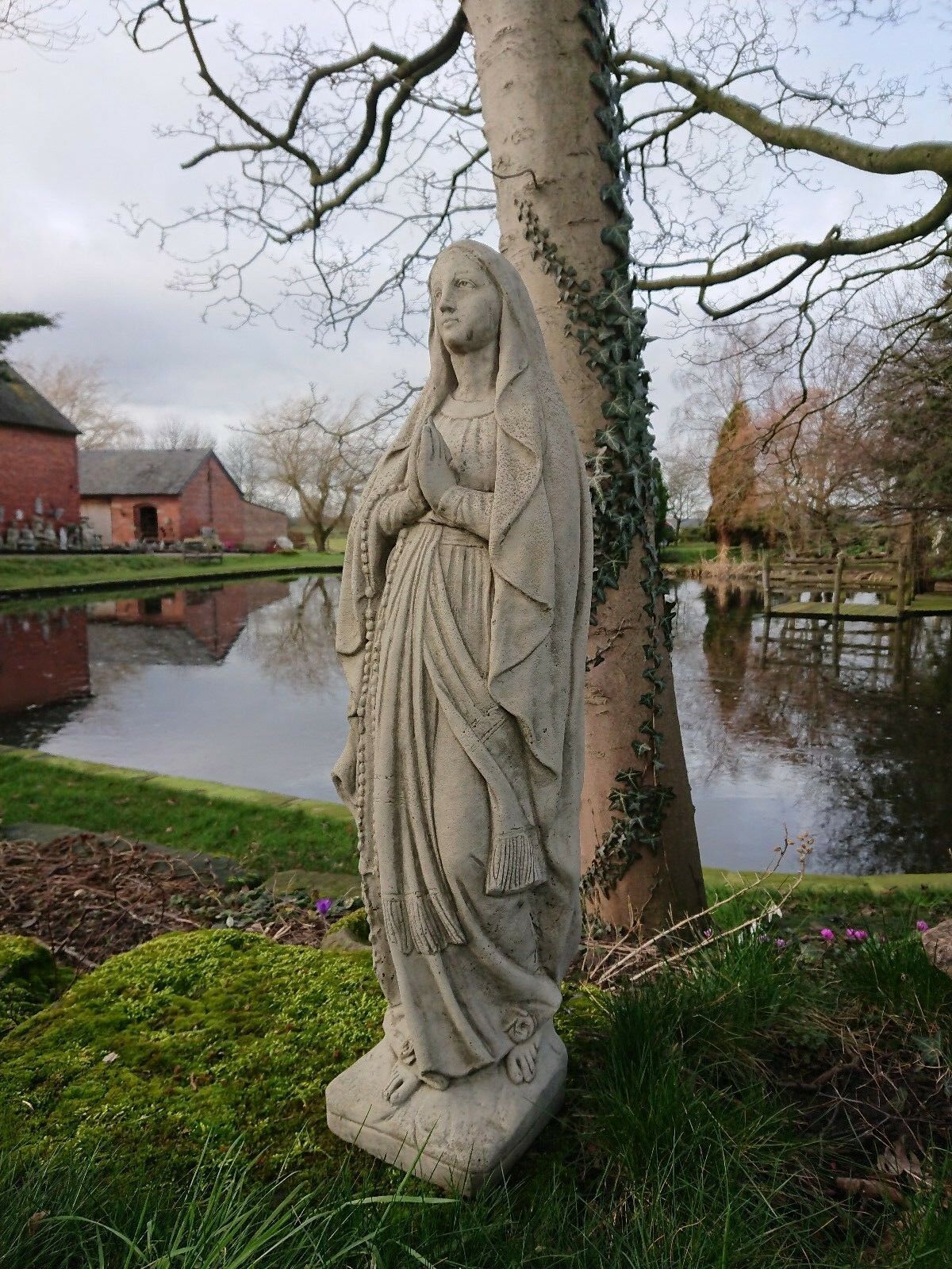 Stone Virgin Mary statue